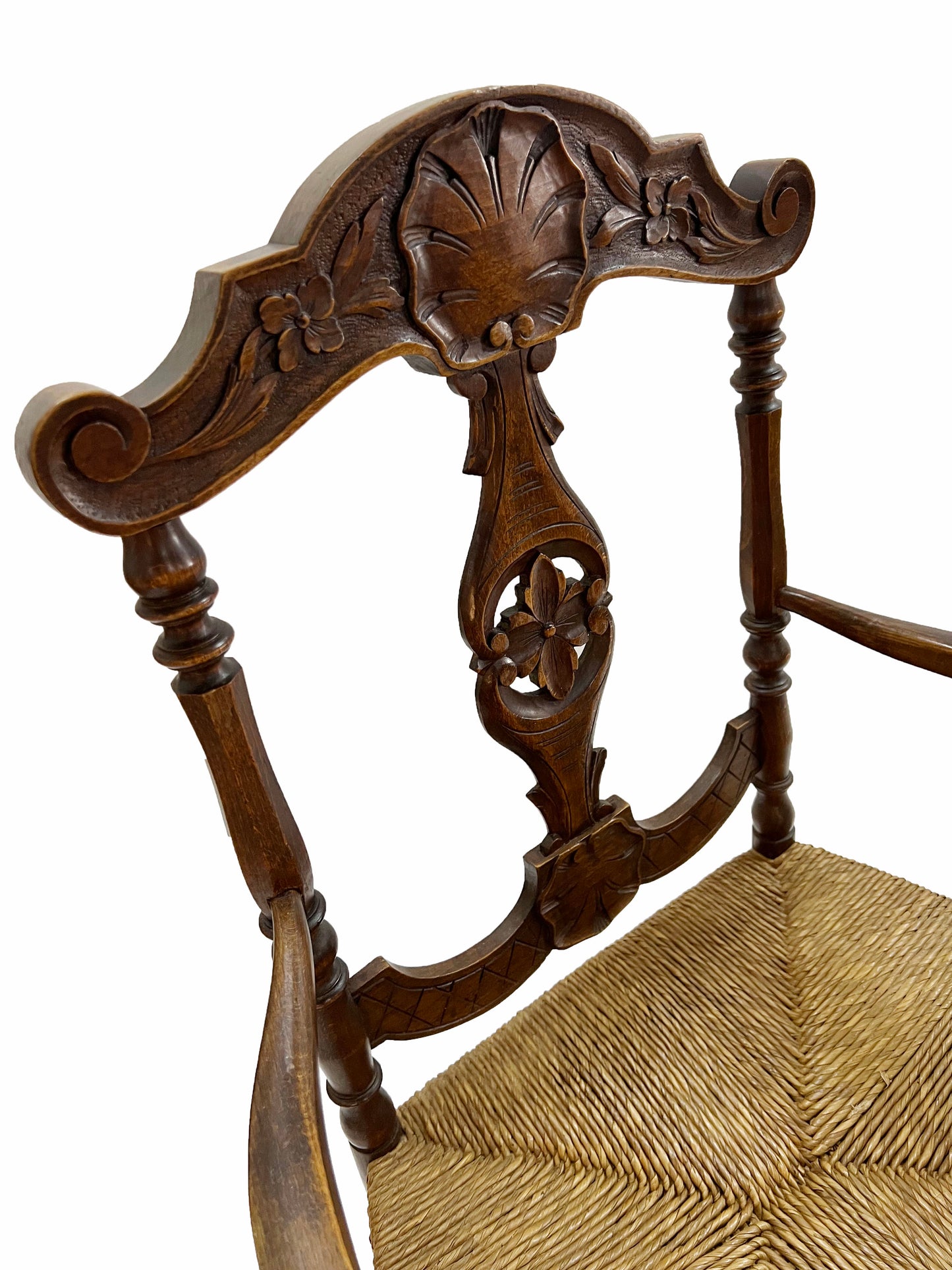 A pair of French oak armchairs.