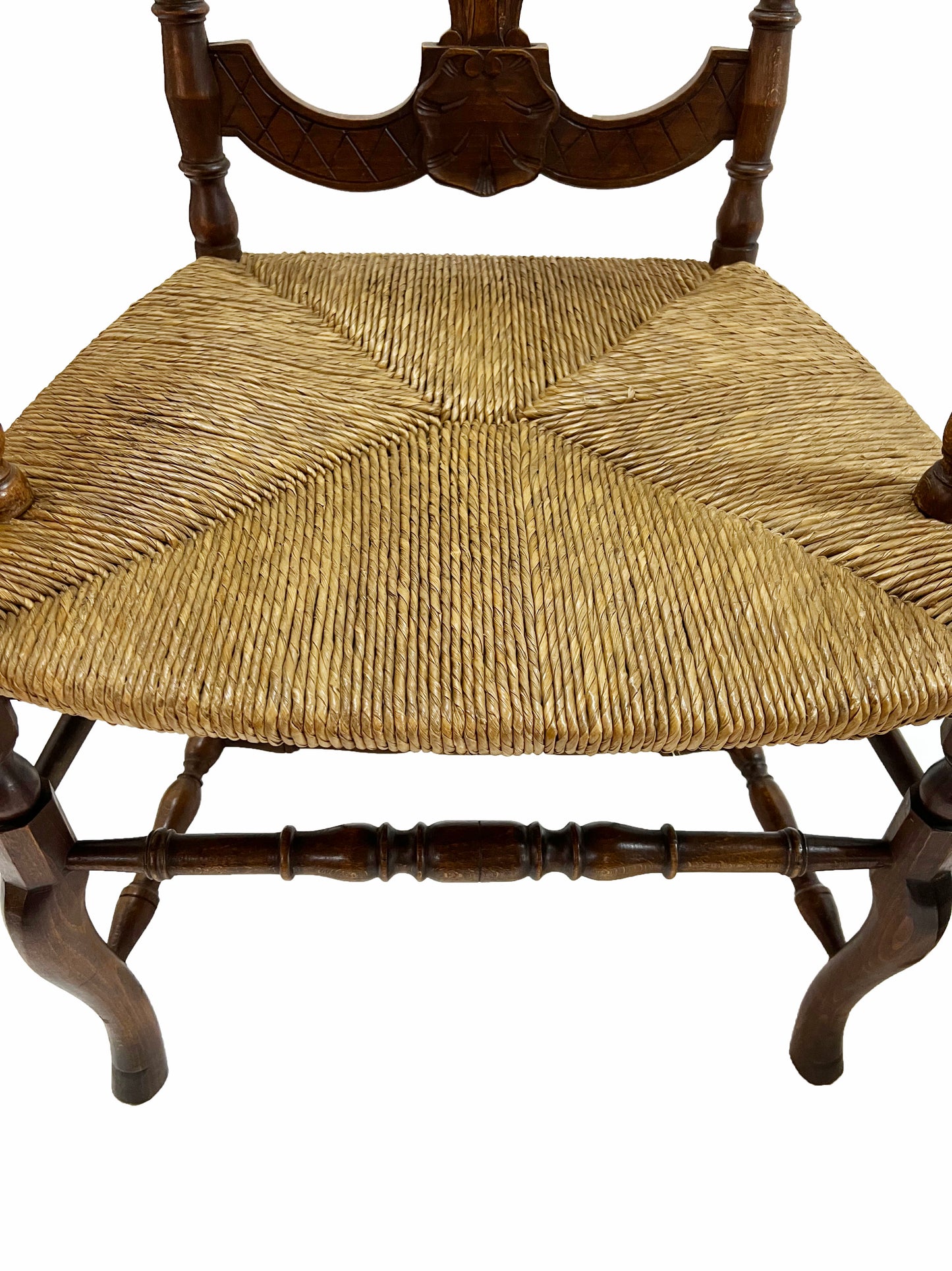 A pair of French oak armchairs.