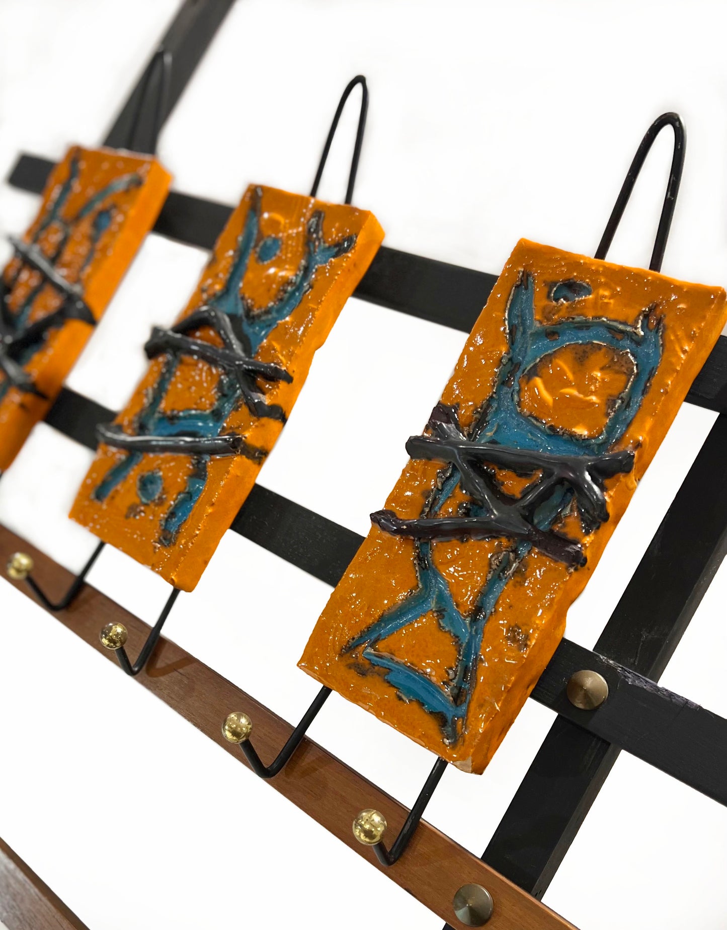 A pair of Italian mid century wall mounted hat or coat racks