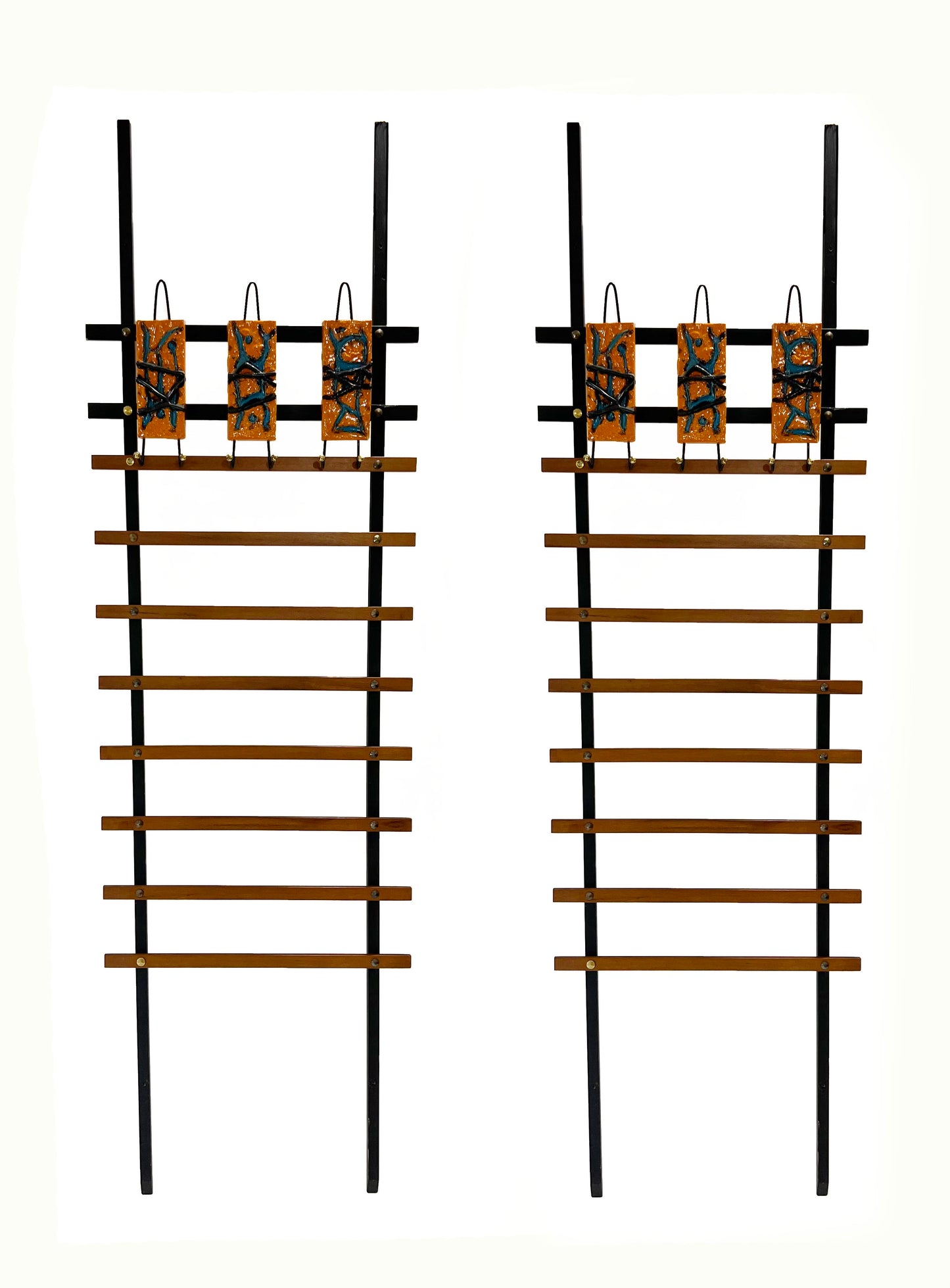 A pair of Italian mid century wall mounted hat or coat racks