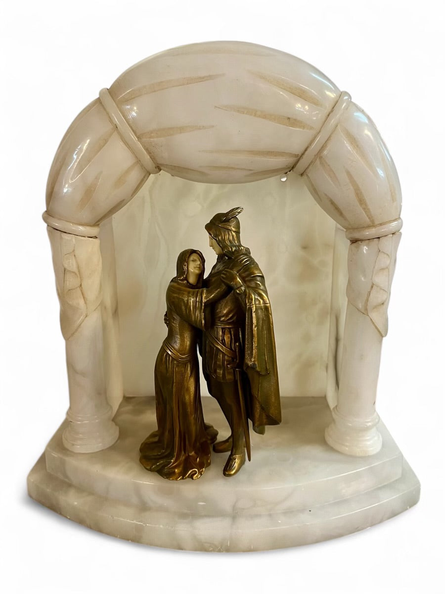 Vintage Art Deco alibaster lamp with gilded bronze figures, the figures have carved bone face