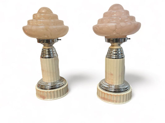 A pair of vintage 1930 white bakelite and chrome column, with shades of pink, art deco table lamps.
