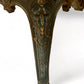 A antique 19th century French parcel gilt winged back arm chair, supported by 4 carved