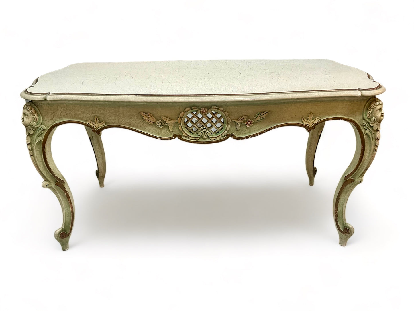 A vintage 1920 French carved, parcel gilt and painted with crackle finish coffee table