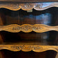 A antique 19th century French carved oak free standing spice rack, decorated with carved foliage on the front