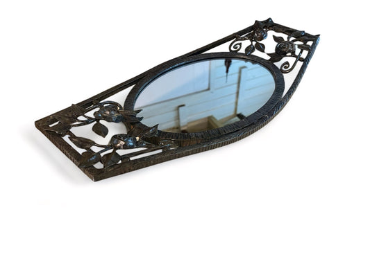 Vintage French art deco oval mirror set in a wrought iron frame decorated with flowers
