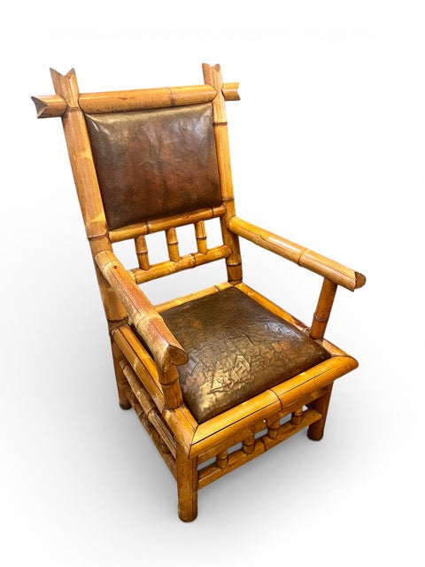 Antique Perret and Vibert French chinoiserie bamboo arm chair with original leather upholstery