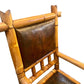 Antique Perret and Vibert French chinoiserie bamboo arm chair with original leather upholstery