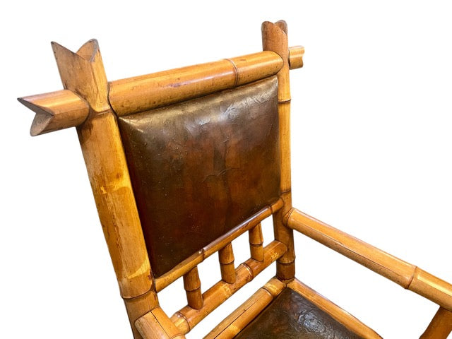Antique Perret and Vibert French chinoiserie bamboo arm chair with original leather upholstery
