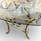 Vintage French Art Deco style wrought iron with gilt finish glass topped table with two chairs