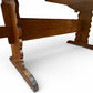 Antique French early 20th century pine provincial refectory table with carved stretcher base