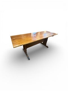 Antique French early 20th century pine provincial refectory table with carved stretcher base