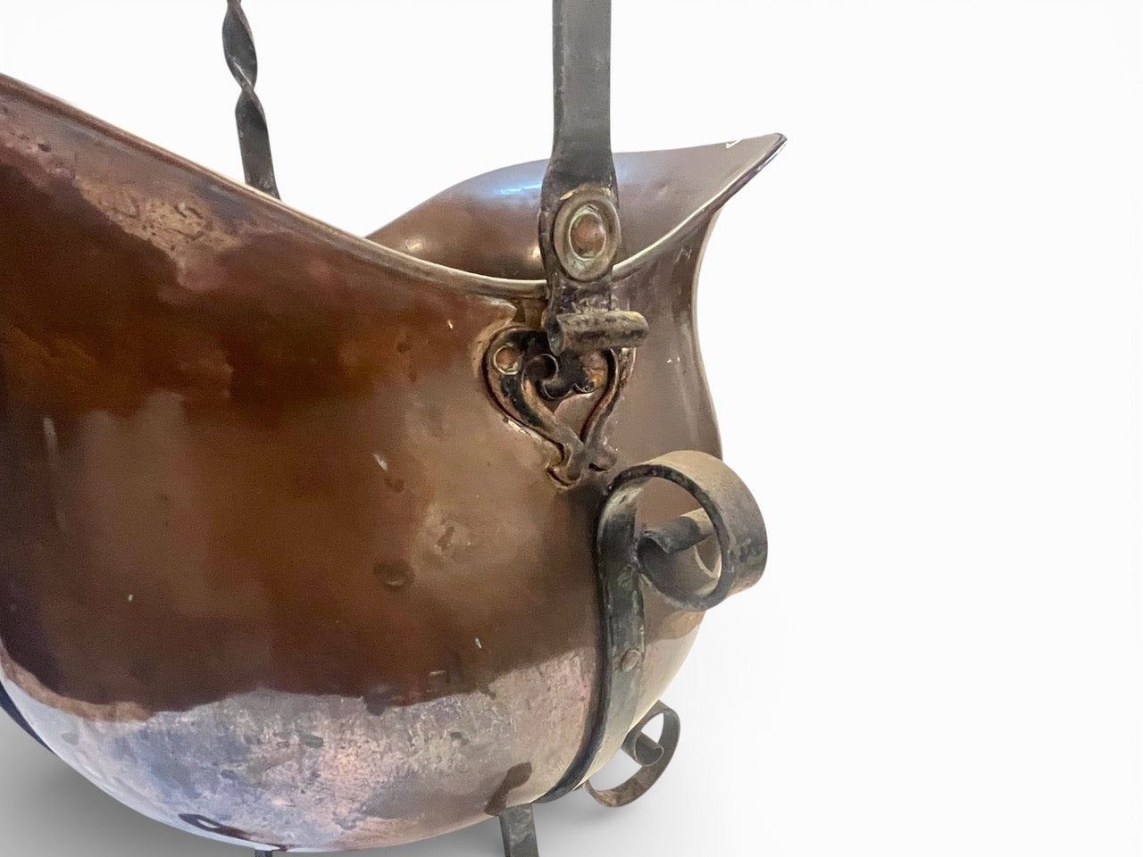 Antique French helmet shaped copper jardiniere mounted in the original wrought iron stand