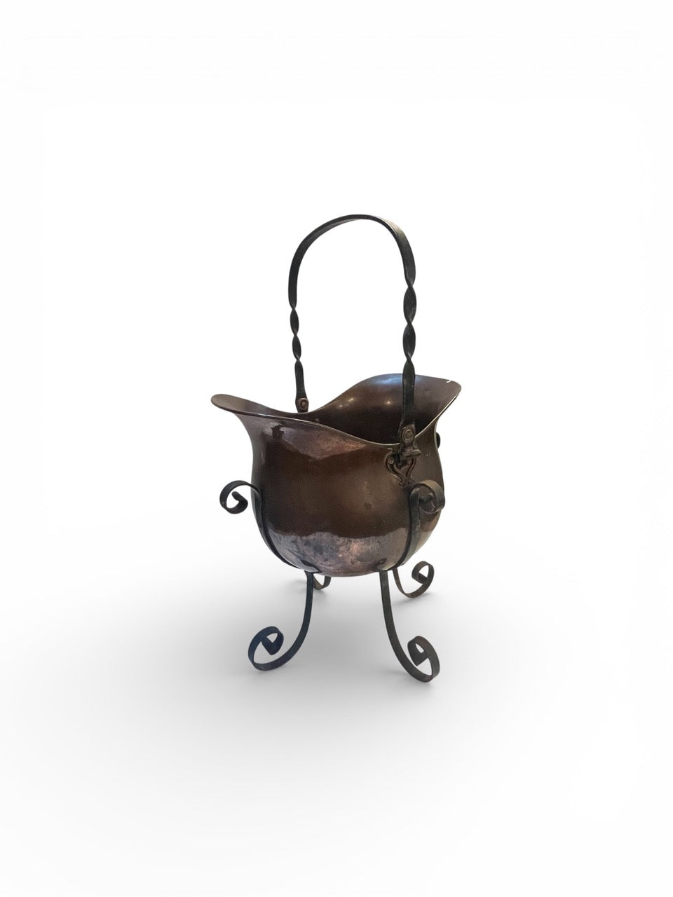 Antique French helmet shaped copper jardiniere mounted in the original wrought iron stand