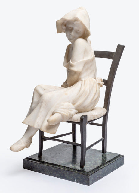 French carved Carrara marble figure of a young maiden seated in a bronze ladder back chair