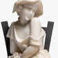 French carved Carrara marble figure of a young maiden seated in a bronze ladder back chair