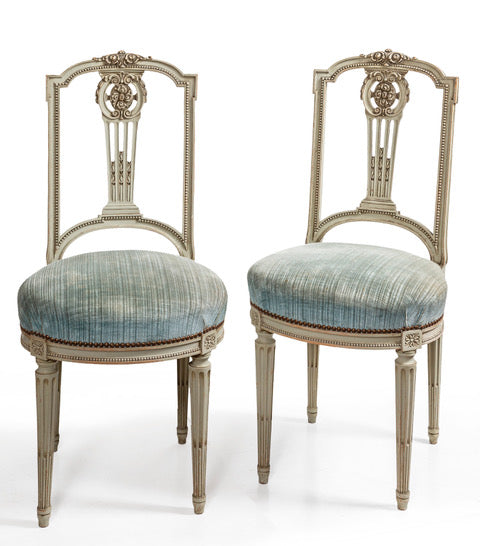 Antique pair of 19th century carved and painted walnut French Louis XVI style salon chairs