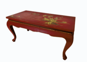 Red and gilded lacquered coffee table.